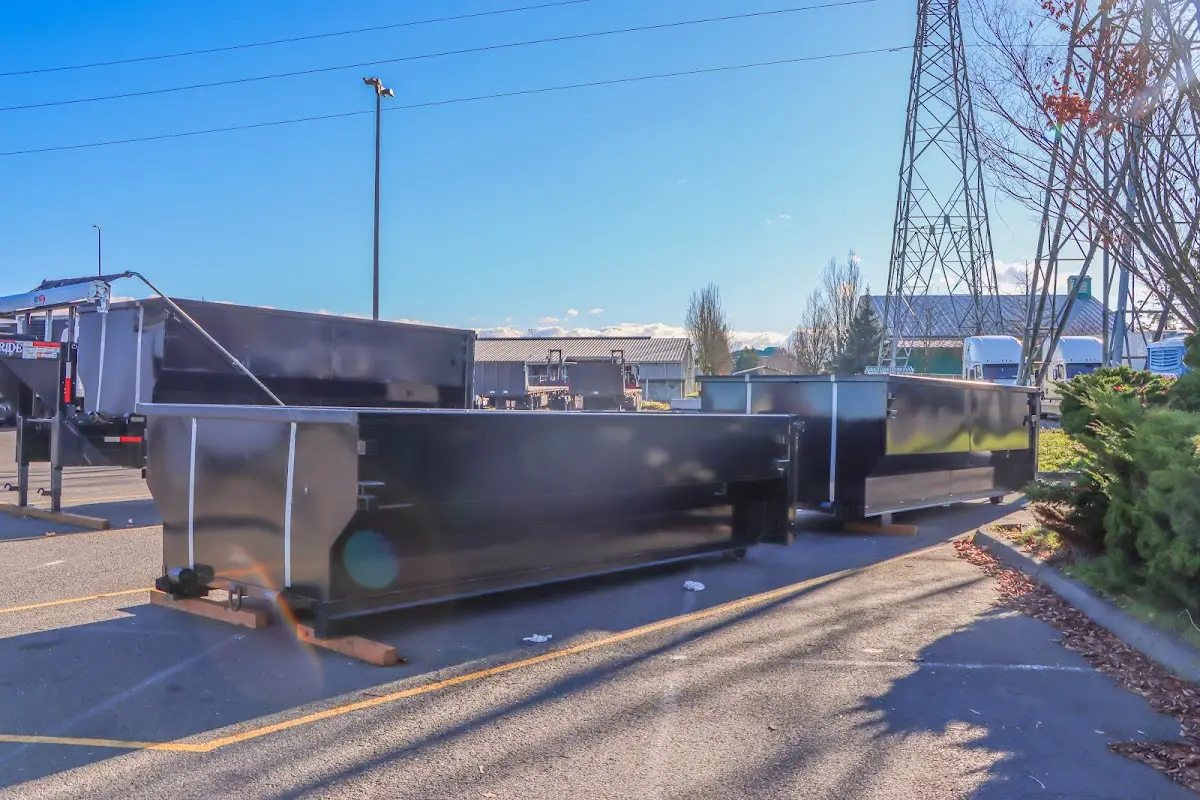 Roll-off dumpster ready for waste disposal at job site for Demolition Dumpster Rental in Maryland Heights